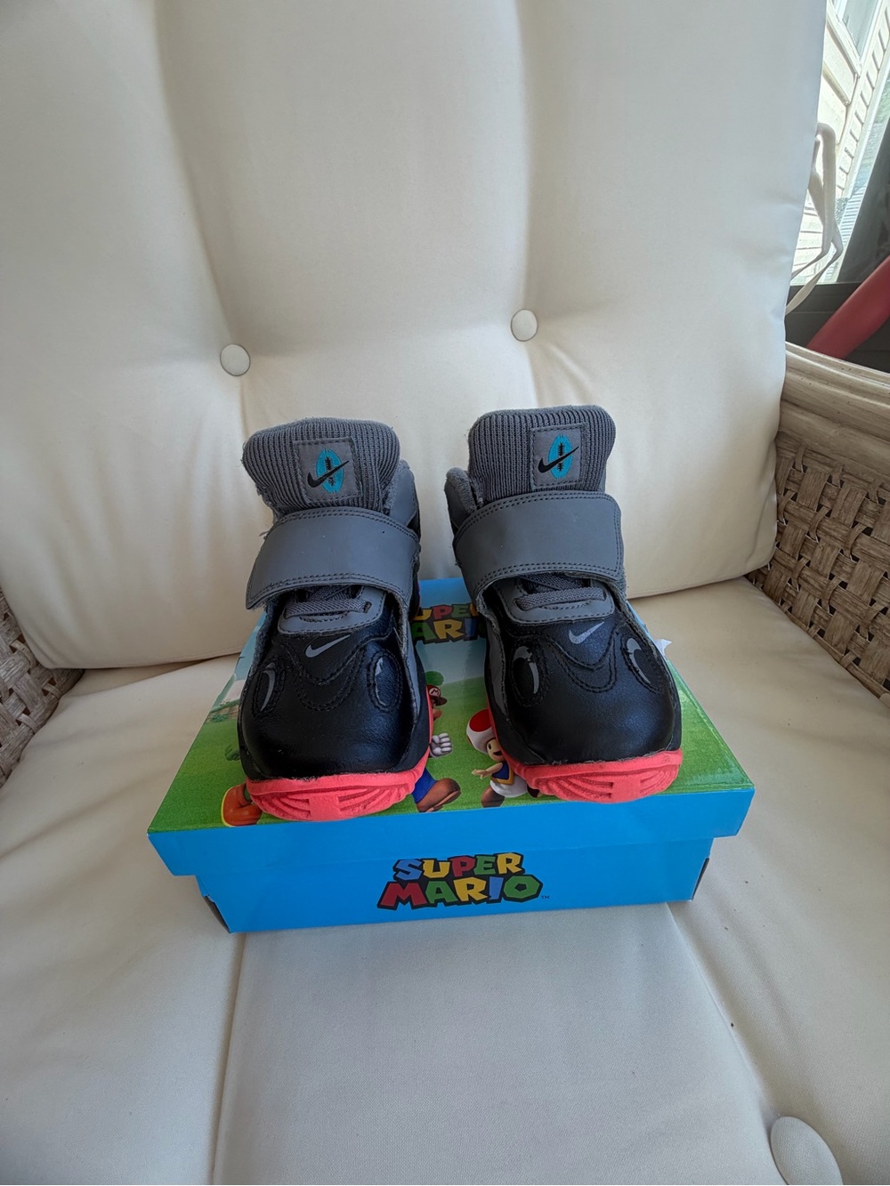 NIKE Gray and Black Athletic Shoes with Coral Accents